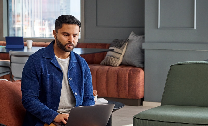A participant working remotely in a communal space.  